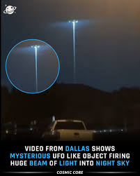 Cosmic - A video uploaded on June 9 from Dallas, Texas shows a group of people reacting in shock as a powerful beam of light appears to descend from the sky. The