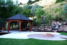 Garden grill gazebo overlooking a natural fire pit area viewed from the lower fire pit area, the impressive stone and wooden gazebo is a large feature of the heavily landscaped backyard. 55 Best Backyard Retreats With Fire Pits Chimineas Fire Pots Fire Bowls Western Timber Frame