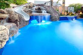 Some other key features include: Backyard Oasis Pool Spa Swim Up Bar Grotto Slides Water Features Mediterran Pools Phoenix Von Unique Landscapes And Custom Pools Houzz
