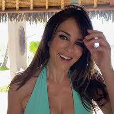 Elizabeth Hurley looks stunning in her companys teal bikini