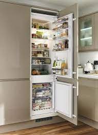 This steam oven is tucked into the island to make it slightly less noticeable and to keep the rest of the kitchen streamlined. 7 Best Hidden Fridge Ideas Hidden Fridge Kitchen Design Integrated Fridge