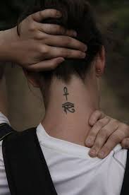Osiris is one of the most well known egyptian deities. Dark Black Ink Egyptian Ancient Symbols Ankh And The Eye Of Horus Tattoo On Lady S Neck Tattooimages Biz