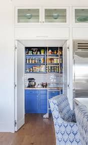 Pack up your kitchen cabinets neatly. Kitchen Pantry Hidden Behind Faux Cabinet Doors Cottage Kitchen