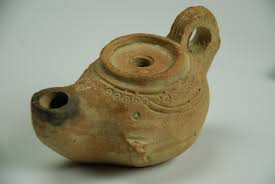 Oil lamp consisting of a small dish in terracotta with its lip pinched to receive a wick. 9 Ancient Roman Islamic Oil Lamps Ancient Glass Blog Of The Allaire Collection