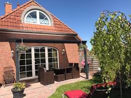 Ferienhaus Mit Kamin Boot Eingez Garten Hundestrand Kleine Friesenkate In Timmel Ostsee Urlaub Ferienhaus Ferienhaus Outdoor Dekorationen