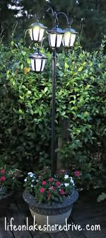 Diy Solar Light Lamp Post With Flower Planter Life On Lakeshore Drive Backyard Solar Lights Diy Solar Outdoor Flower Planters