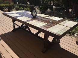 For the most versatility, choose an expandable table with leaves that will allow you to seat more people when company comes for tight spaces, consider creating a dining nook in a corner with banquette seating lined up against 1 or. Diy Large Outdoor Dining Table Seats 10 12 Outdoor Dining Table Diy Outdoor Table Large Outdoor Dining Table