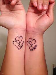 Mother Daughter Tattoos Unique Meaningful Awesome 50 Sister Tattoos Ideas Sister Tattoos Sister Heart Tattoos Sister Tattoo Designs