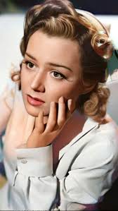 Anne Shirley with Barbara Stanwyck and John Boles in a publicity photo for  "Stella Dallas." Born