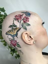 In the world of tattooers, there are real people inked with real. Beautiful Head Tattoo Alopecia Butterfly Flowers By Miss Terri Bald Head Tattoo Head Tattoo Hair Scalp Tattoo