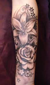 red rose and pink oriental lily tattoo google search lilien tattoo tattoo arm frau blumen weibliche arm tattoos