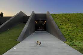 The cost to build the home remained on par as conventional homes. Modern Semi Underground Homes That Become One With The Land