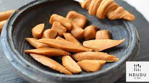 Heat all of your ingredients (except for the nuts and chocolate) in a nice sturdy saucepan on med heat until butter is if your toffee doesn't have a hard texture (where you can snap it in half) you did not cook it long enough. Ndudu By Fafa Condensed Milk Caramel Candy Toffee Recipe