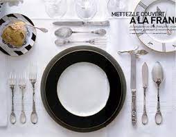 You may find a small glass for liqueur or a champagne flute as well. Friday French Table Arrangement French Table French Table Setting Table Arrangements