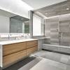 Use reflective bathroom tile ideas to bounce the light. 3