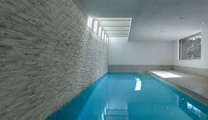 Installer une piscine hors sol dans son jardin. Striking Indoor Pool By Portrait Pools Piscine Sous Sol Piscine Interieure Piscines Interieur