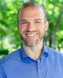 Up next in our introductions, please say hello to Michael Carson! Michael  Carson has been a musician since way back in the fourth grade. He is a  bass-baritone who enjoys singing opera,