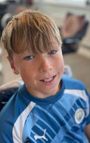 Meet this happy young lad, rocking his brand new curly hair with confidence  and style! 🌟 His curls are bouncing as high as his spirits, and he's  loving every moment of his