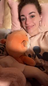 As I read this, I'm laying in my pretty pink bed, wearing a pretty pink  Disney sweater, & snuggling with a weighted fox stuffie. Across from me,  one of my bookshelves features