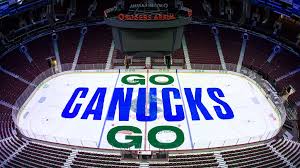 Tom kuhnhackl scores from his back against vancouver canucks. Canucks Unveil Massive Warm Up Sign