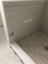 Pick the right tile and test it out, then choose your grout color and type. Shower Wall Subway Tile Falling Off Before Grout