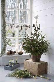 All of these scandinavian christmas decorations are easy to install. 76 Inspiring Scandinavian Christmas Decorating Ideas Digsdigs Scandinavian Christmas Decorations Christmas Entry Scandinavian Christmas