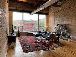 Modern And Contemporary Loft Living Room With Exposed Brick Exposed Ductwork Hardwood Floors Ex Living Room Loft Black Leather Couch Living Room Loft Living