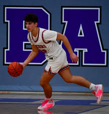 photo gallery of Albany boys basketball 2024 win vs ROCORI