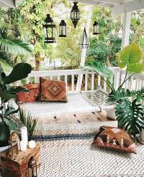 Complete your space and add warmth with outdoor string lights and lanterns. Awesome Boho Front Porch Decoration Chic Outdoor Furniture Decor Home Decor
