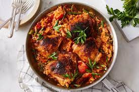 One Skillet Paprika Chicken Thighs Pepper Rice Recipe On Food52 Recipe Paprika Chicken Thighs Food 52 Paprika Chicken