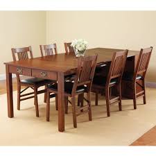 Classic mission or craftsman dining furniture often features elegantly simple designs, heavy proportions, and accented joinery. Expanding Dining Table Hutch Hammacher Schlemmer