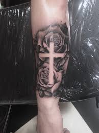 However, one should be mindful of the type of cross they want in the design, such as gothic cross representing darkness and death, or a wooden cross indicating spirituality and christian faith. Download 26 Forearm Male Cross And Rose Tattoo
