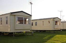 Static Caravan Holiday Homes On Camp Site Two Static Caravans Or Mobile Holiday Affiliate Camp Sit Static Caravan Holidays Caravan Holiday Holiday Home