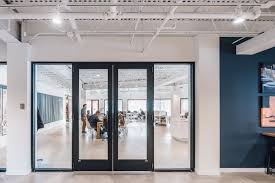 Joy Martin Architecture Corporate Office Space Design The Glass Doorway Keeps The Space Luminous A Office Space Design Office Space Corporate Space Design