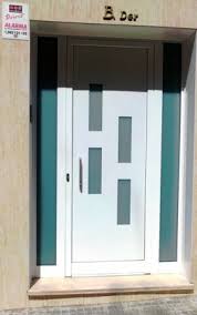 Puerta exterior de aluminio corta vientos con gatera aluxsa tenerife. Puertas De Aluminio En Cornella De Llobregat