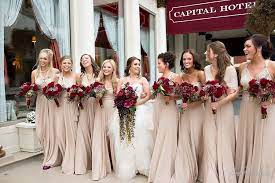 Bridesmaids in flower crowns and fur wraps. Gorgeous Flowers Love The Bridesmaids Dress Color Lyndseysullivanphotography Com Champagne Bridesmaid Dresses Burgandy Wedding Wedding Bridesmaid Dresses
