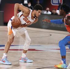 Entering his fourth year in the league, phoenix suns guard devin booker is ready to turn the heat up in the valley of the sun. Devin Booker Suns Crush The Thunder Move To 6 0 In The Bubble Talkbasket Net