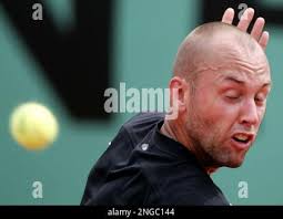 The Netherlands' Peter Wessels closes his eyes while returning the ball to  France's Richard Gasquet during their second round match of the French Open  tennis tournament at Roland Garros stadium, Wednesday May