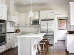 Marble is one of the most classically elegant and beautiful materials out there. White Marble Countertops White Subway Tile Backsplash White Shaker Kitchen Classic White Kitchen Shaker Kitchen Cabinets