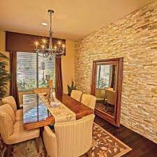 One of the unique things that stacked stone panels can bring to a room when used as an accent wall is the depth the different pieces of stone can bring. Stacked Stone Walls To Add Warmth And Character To Any Room