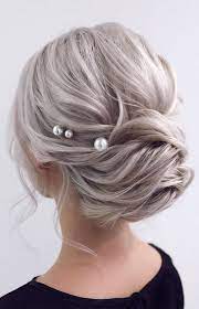 Short, platinum blonde hairstyle with baby bangs and trimmered sides. Elegant Wedding Hairstyles For Beautiful Brides Icy Blonde