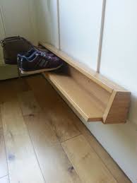 A look inside an ikea trones shoe cabinet. Wall Mounted Shoe Rack From Pax Door Ikea Hackers Flipboard