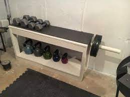 Weight Rack I Really Wanted A Weight Rack To Put In Our Basement Gym But They Re Sort Of Expensive I Built This Weig Home Gym Mirrors Weight Rack Diy Home Gym