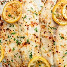 Garlicky Lemon Baked Tilapia Is Crazy Addicting Recipe Baked Tilapia Fish Recipes Tilapia Recipes