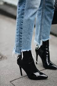 Black Ankle Boots With Blue Jeans Black Vinyl Plc Ankle Boots Stepped Raw Hem Frayed Jeans Jeans And Boots Fashion Boots Outfit