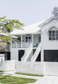 A Classic All White Timber Queenslander In Brisbane House Paint Exterior Queenslander House Exterior House Colors