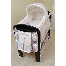 Probably The Coolest Bassinet Ever Bassinet Changing Table And Storage All In One The Moses Basket Is Removab Bassinet Baby Bassinet Baby Girl Bassinet