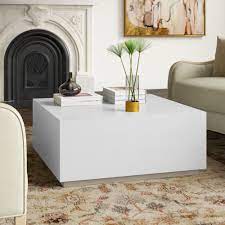 The tabletop is made from solid pine wood and has a butcher block style with visible wood grain and knots for a rustic, antique look. Bernhardt Axiom Block Coffee Table Reviews Perigold