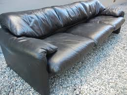 Maralunga is the embodiment of the very idea of comfort, with an adjustable headrest for a high or low backrest version obtained by inserting a simple bicycle chain inside the foam of the backrest. Maralunga Sofa By Vico Magistretti For Cassina Wow Interiors