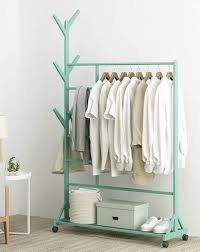 How to turn your garment rack into home decor stylecaster. 14 Clothes Racks That Store Your Garments In Style Living In A Shoebox
